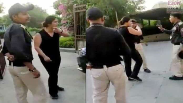 lady abusing security guard-noida