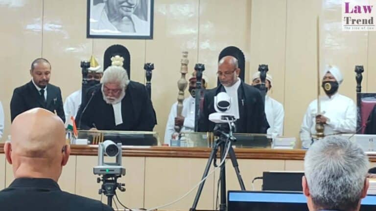 Justice Biswadeep Bhattacharjee taking oath