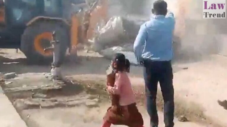 girl running with books during UP demolition
